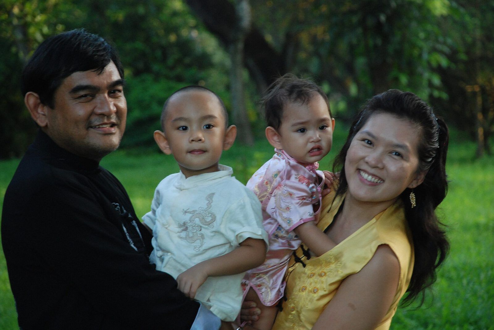 Filipino parents with their young children